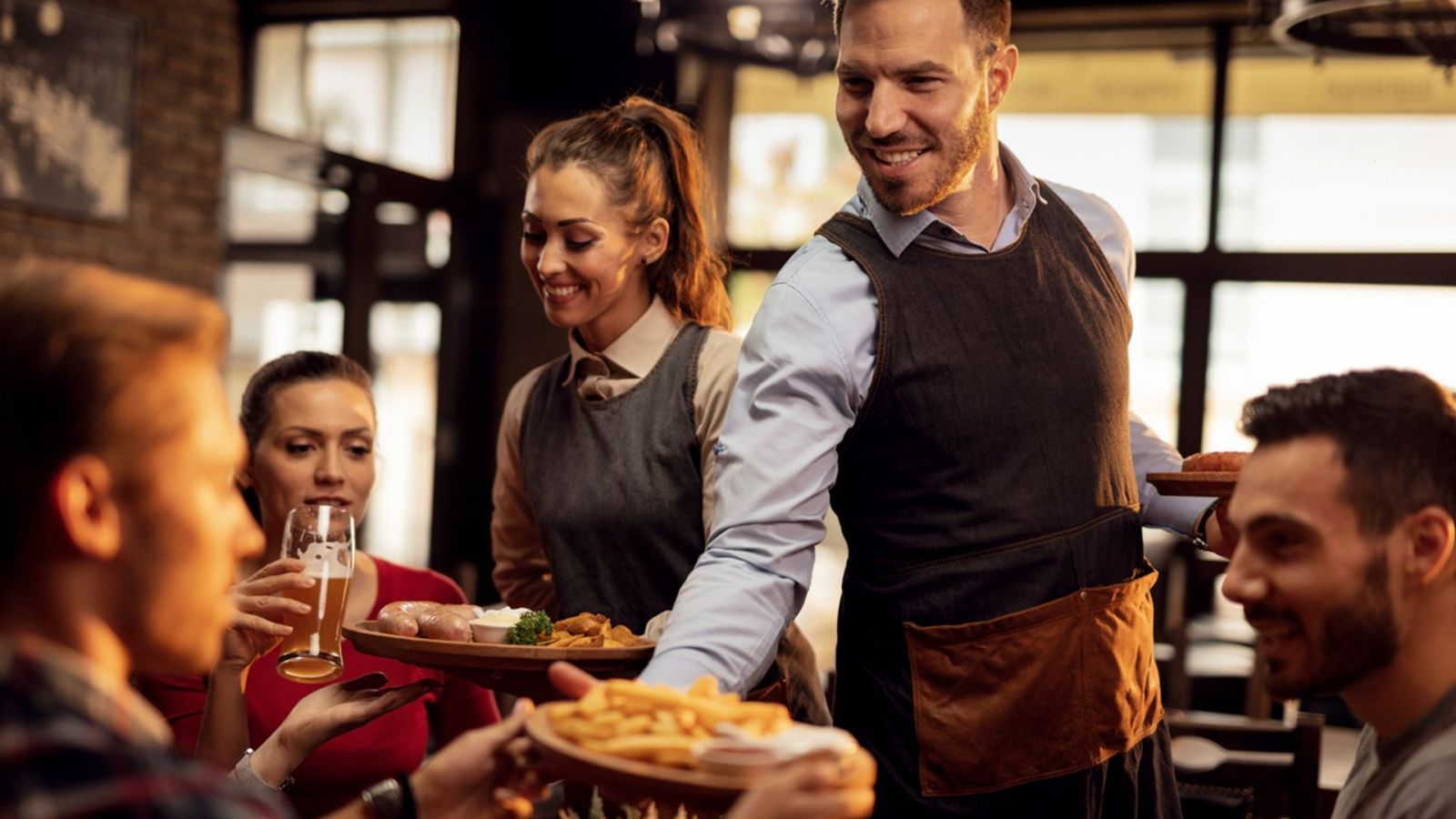 waiter serving at a restaurant