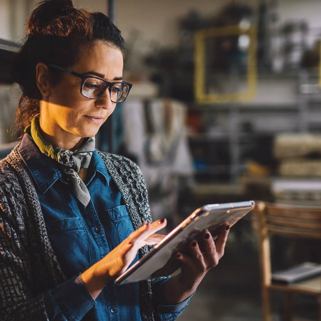 Woman checking tablet